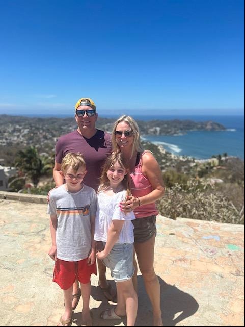 Jantz Hoffman with his wife Emily and children Tavia and Calum